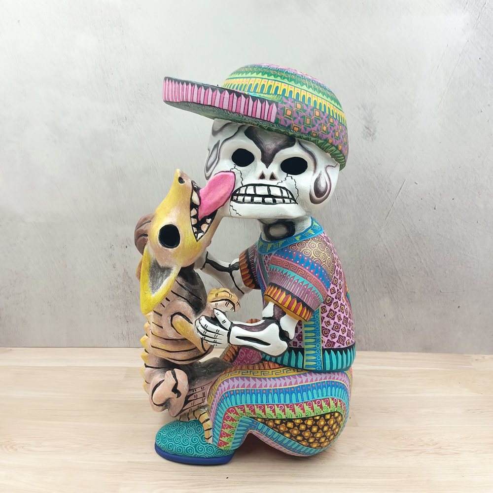 Alebrije skull with a dog