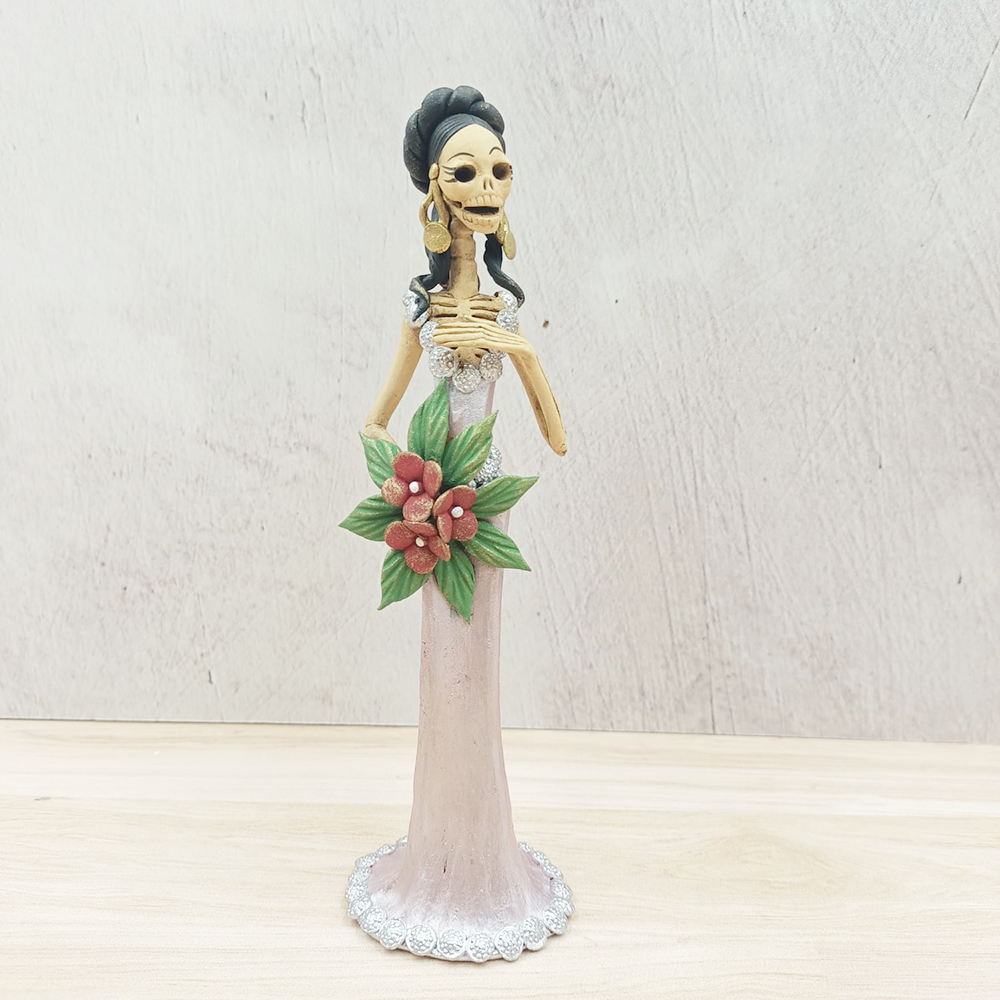 Catrina in pink dress and bouquet of flowers