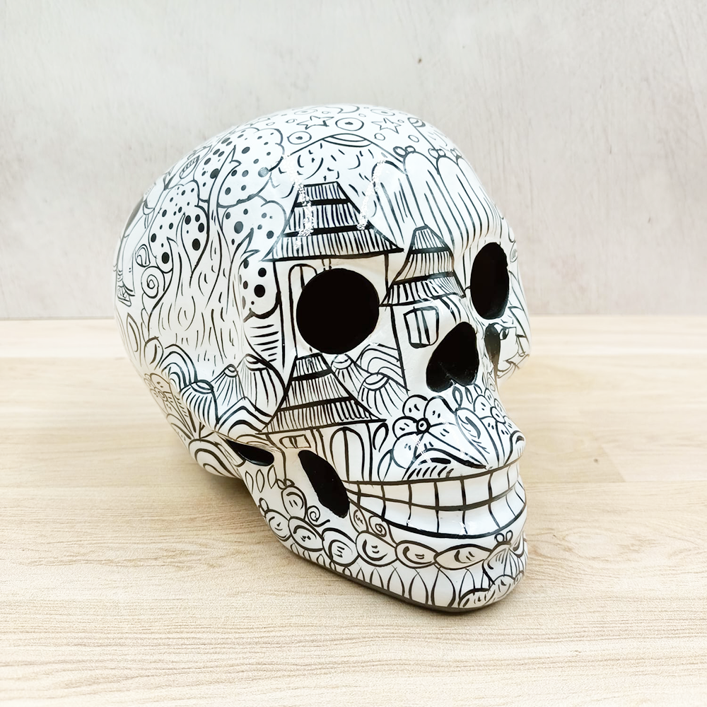 Large decorated black and white skull