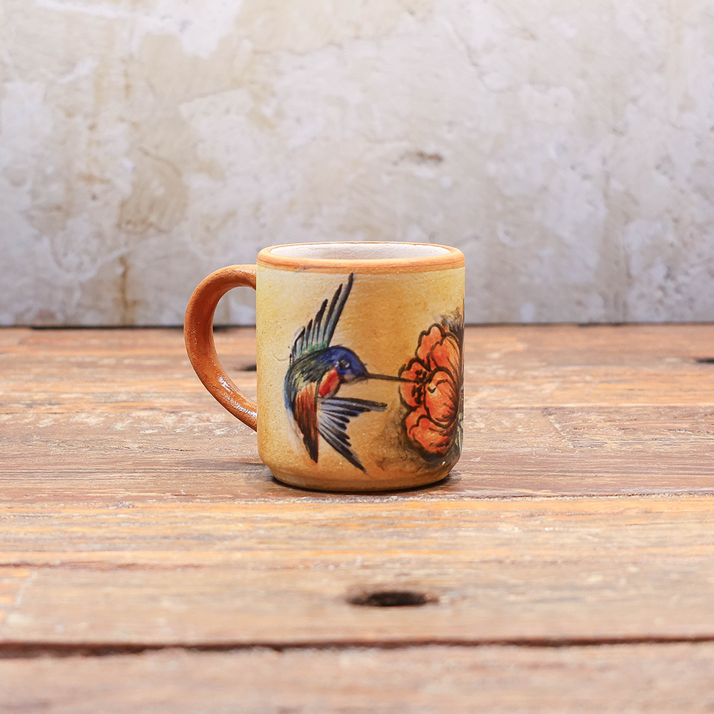 Hummingbird and flowers mug