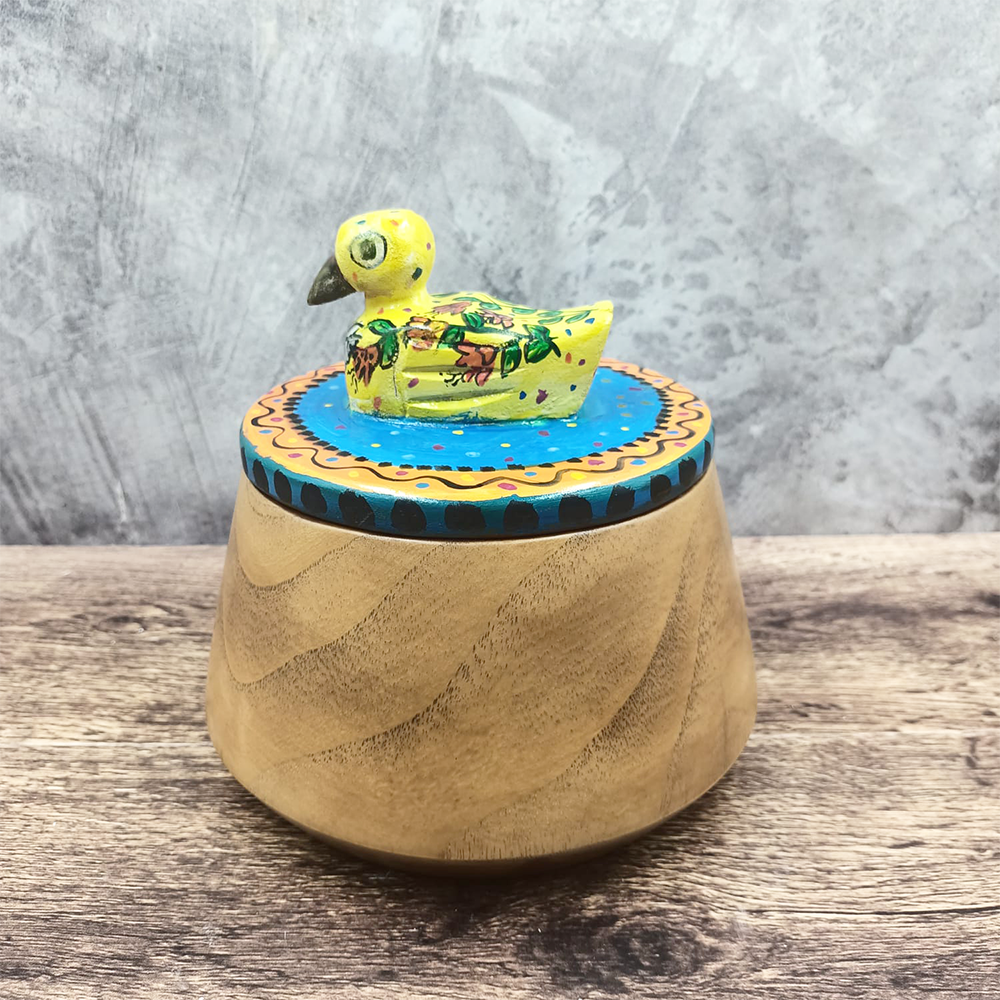 Tortilla holder with decorated lid and duck