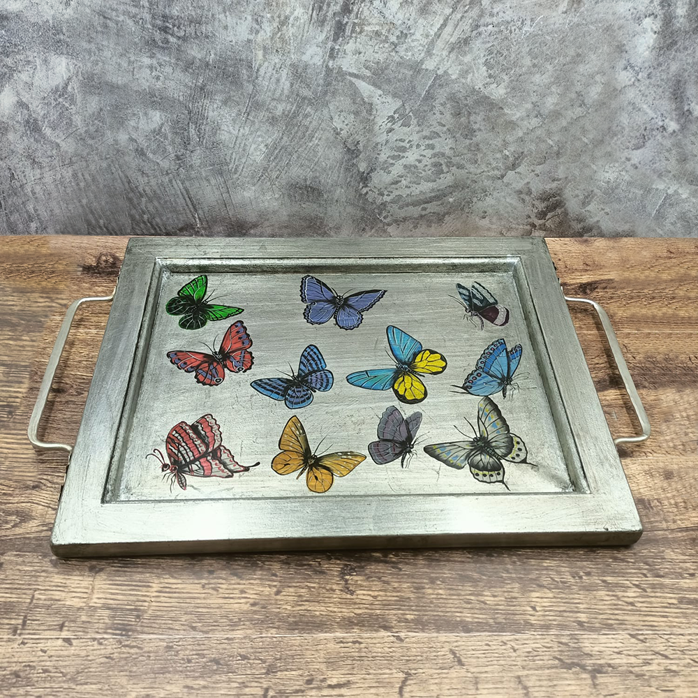 Silver-colored tray with butterfly metal handles