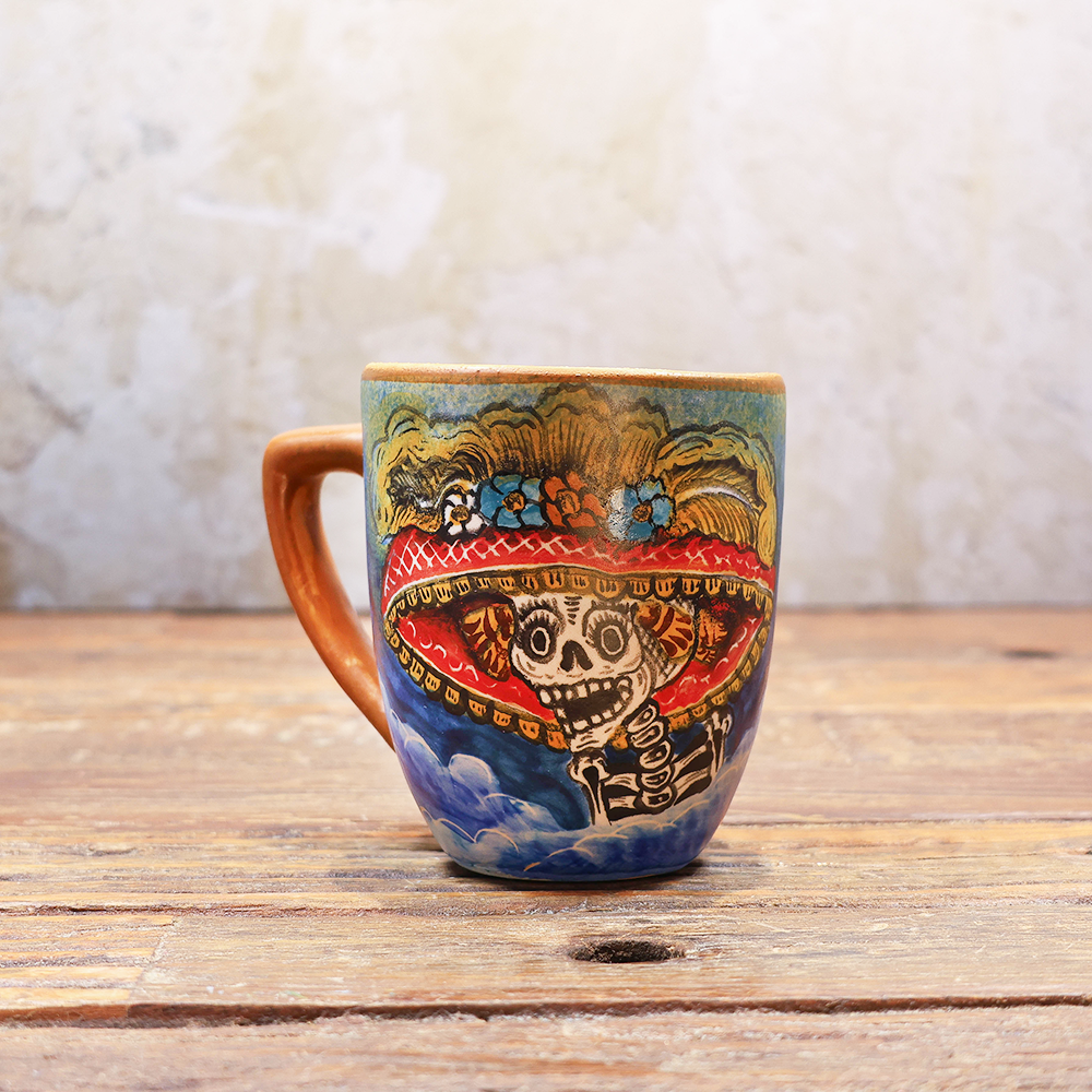 Cup decorated with a large catrina