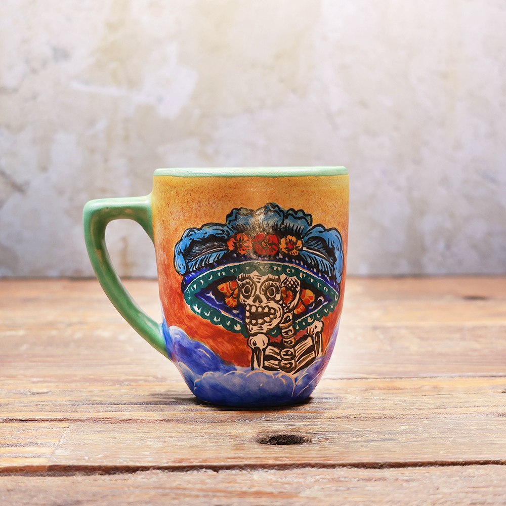 Cup decorated with a large catrina