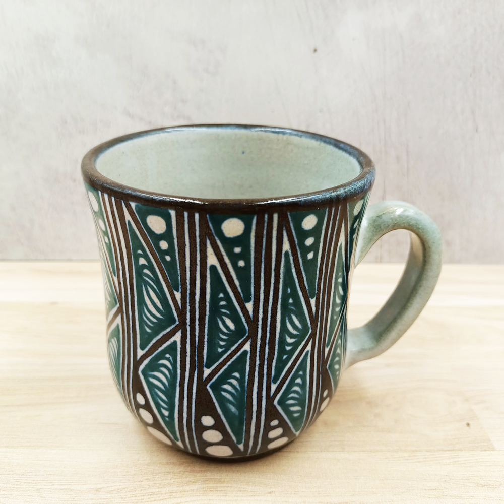 Mug with geometric motifs