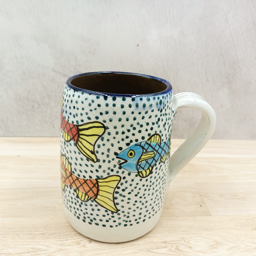 Mug decorated with colorful fish