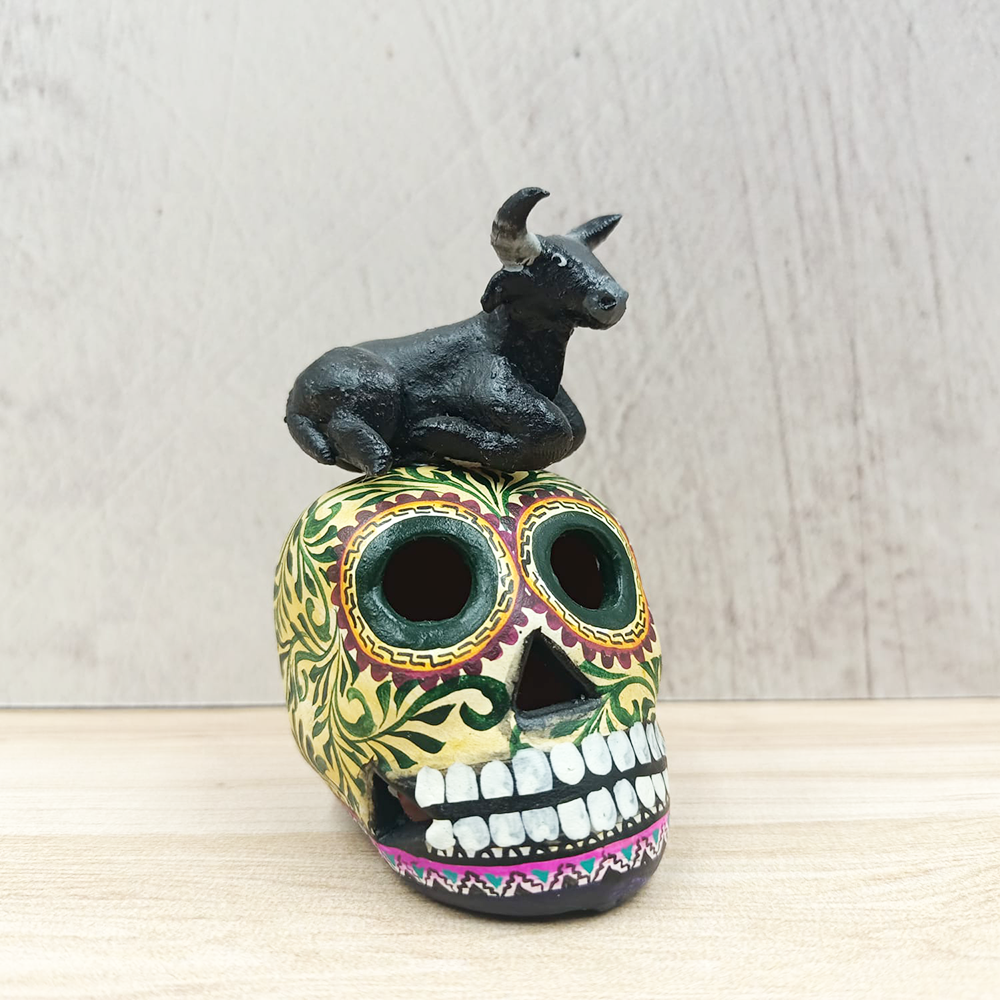 Clay skull with mini bull