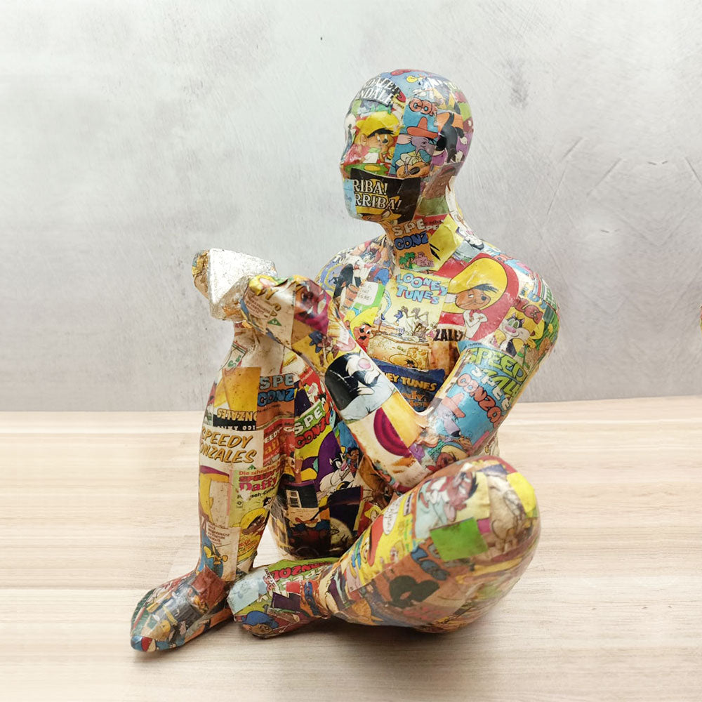 Small Adam with book covered with comic pages – Tikal | Artesanías ...