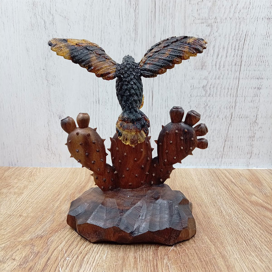 Amber eagle on a prickly pear cactus