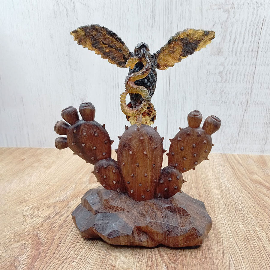 Amber eagle on a prickly pear cactus