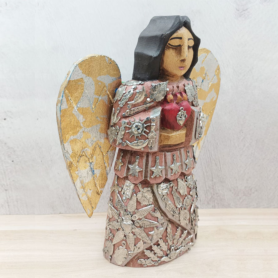 Angel with "milagritos"