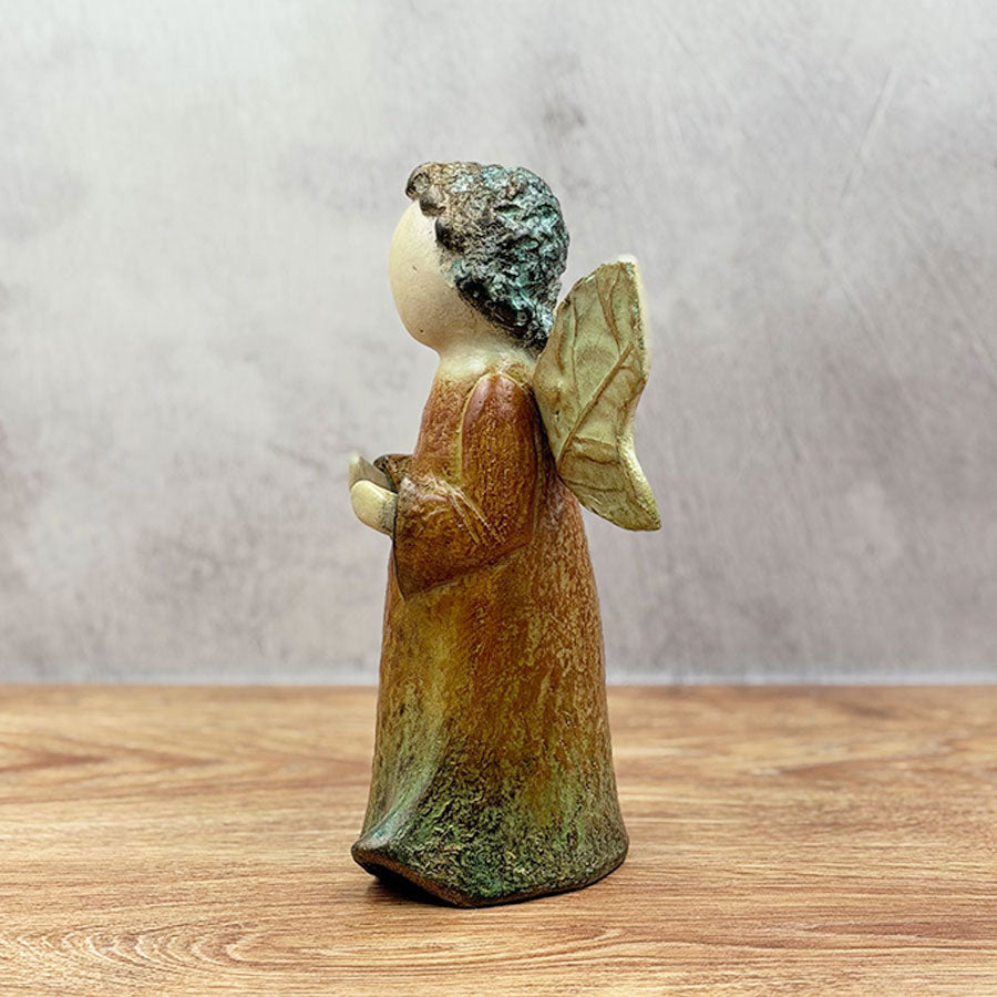 Little angel with green wings
