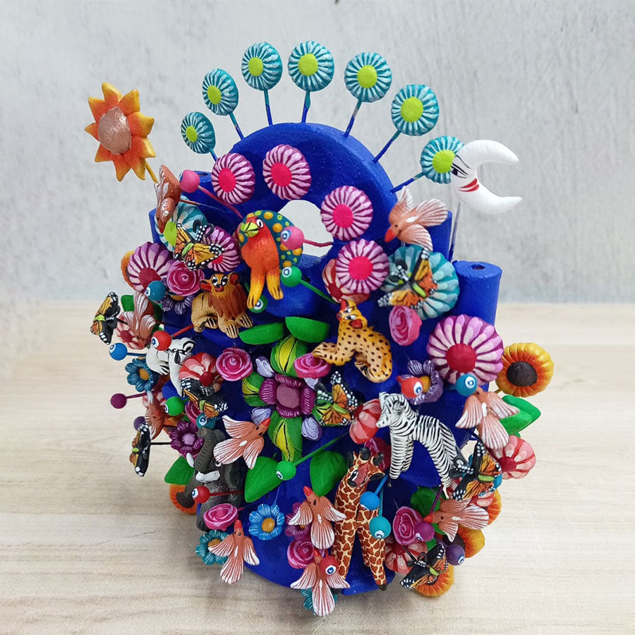 Navy blue tree of life with little animals