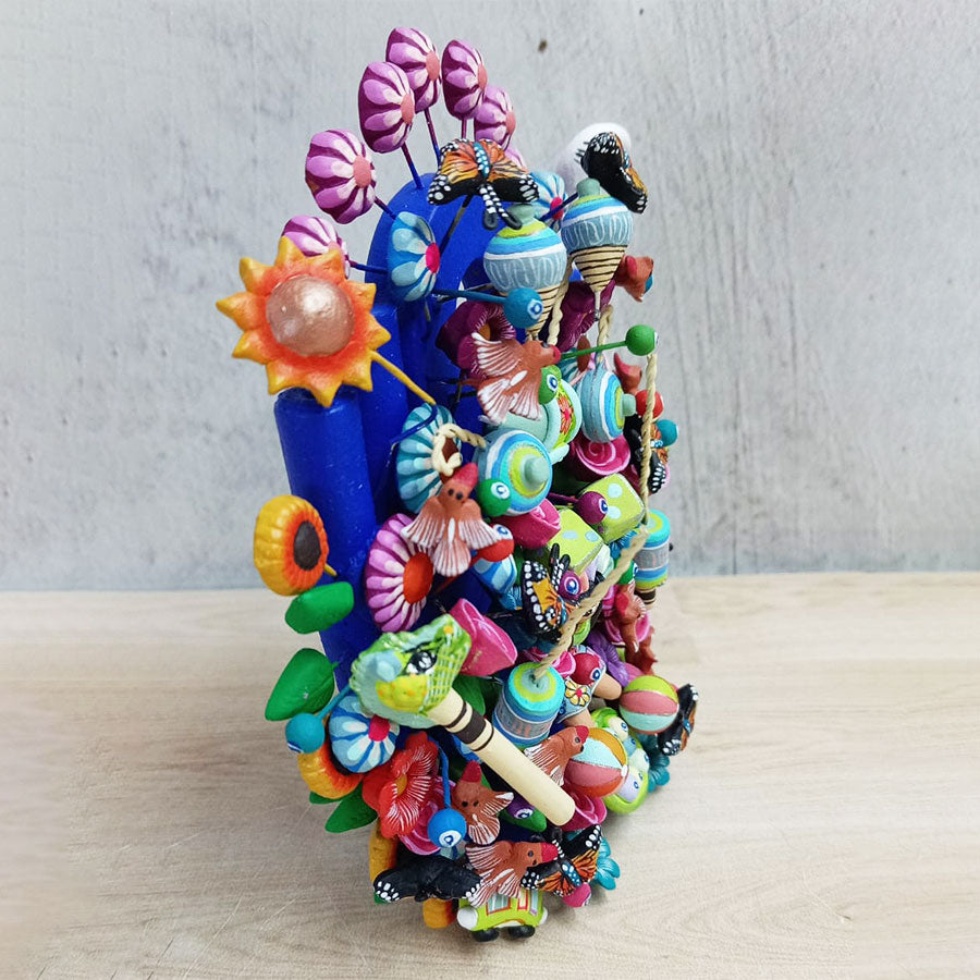 Blue tree of life with Mexican toys