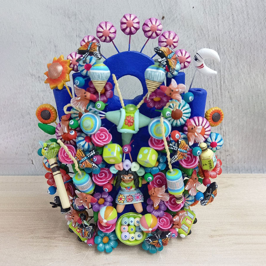 Blue tree of life with Mexican toys