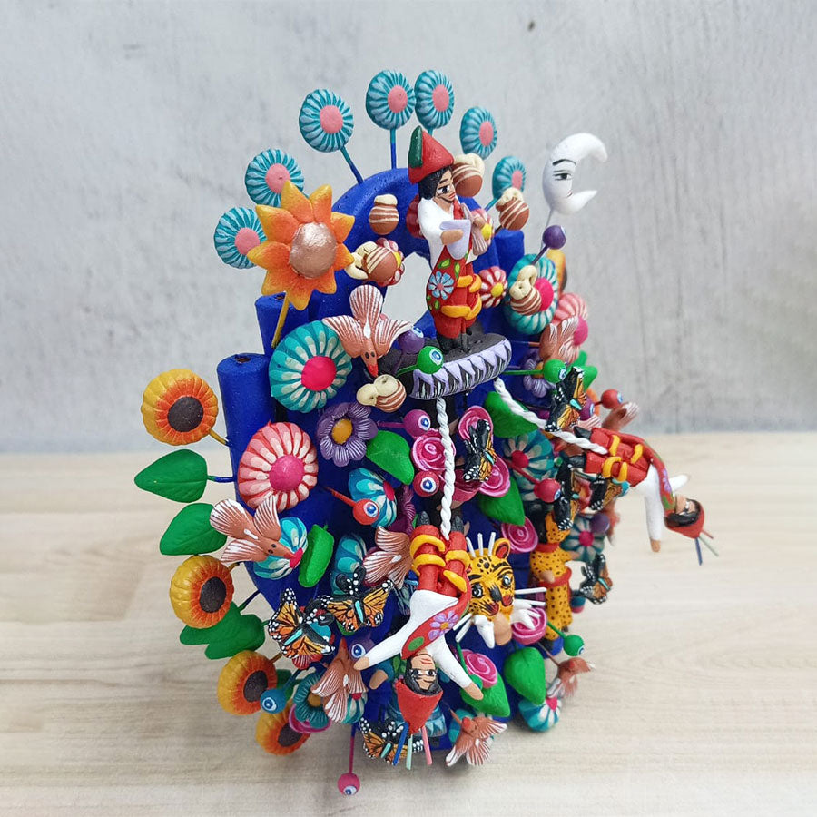 Blue tree of life with Papantla flyers