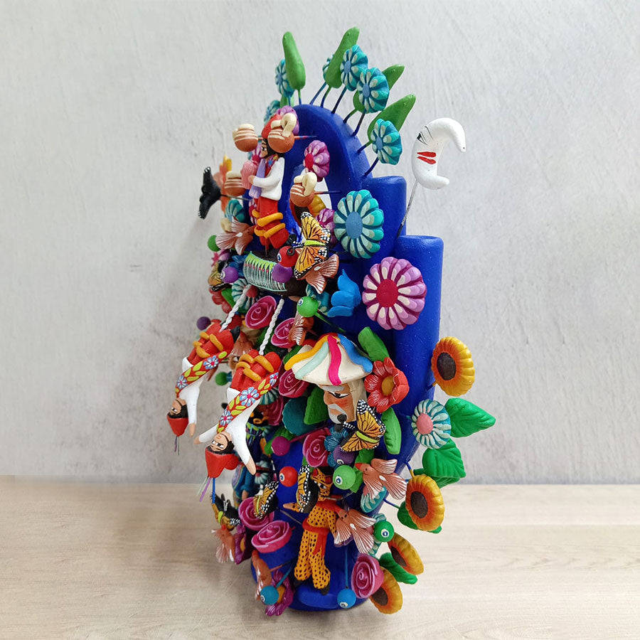 Blue tree of life with Papantla flyers