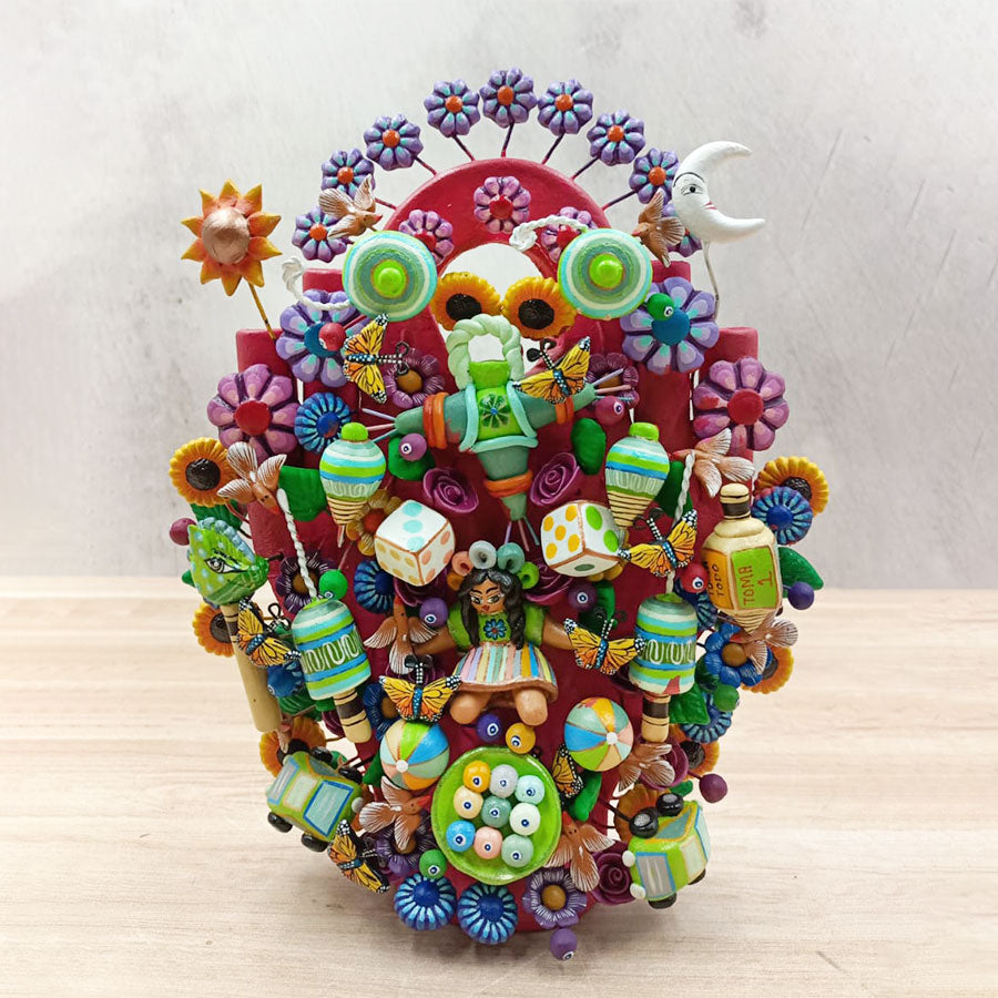 Árbol de la vida rosa con juguetes mexicanos