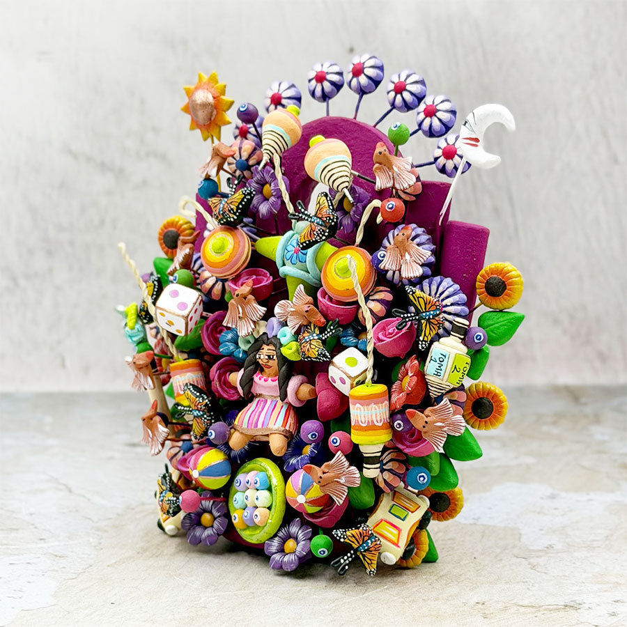 Blue tree of life with Mexican toys