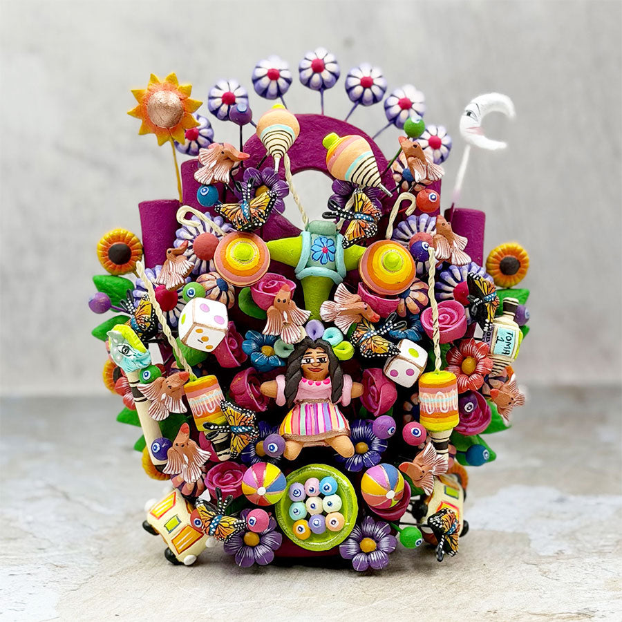 Blue tree of life with Mexican toys