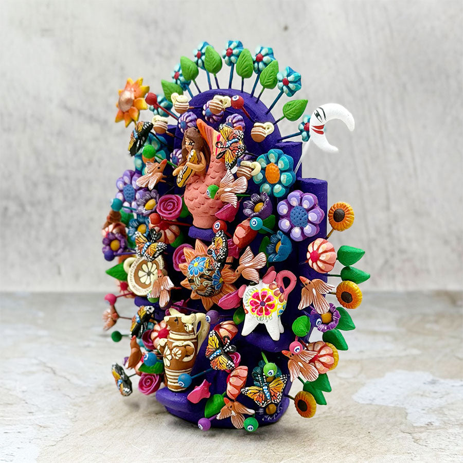 Árbol de la vida con alfarería mexicana