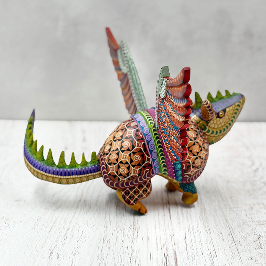 Alebrije armadillo fusion with iguana and brown eagle