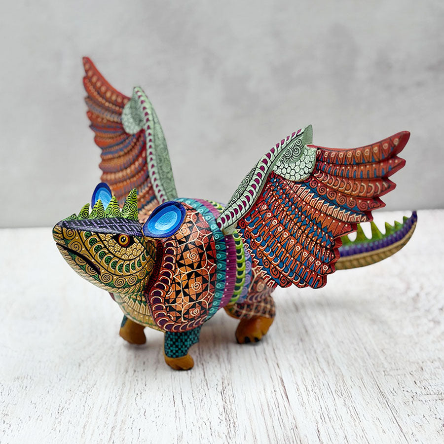 Alebrije armadillo fusion with iguana and brown eagle