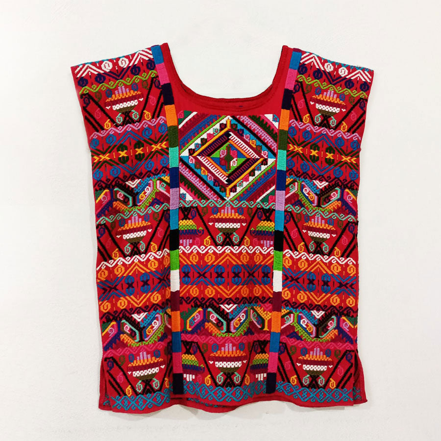 Red blouse with multi-colored stripes without sleeves