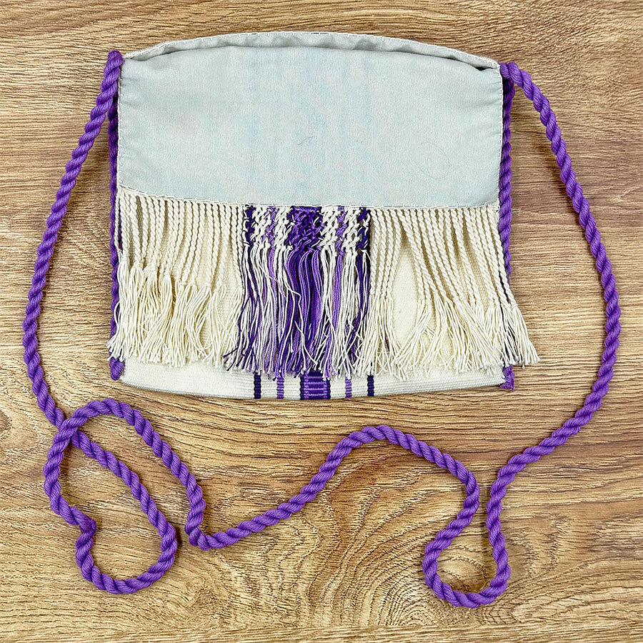 Beige bag with purple
