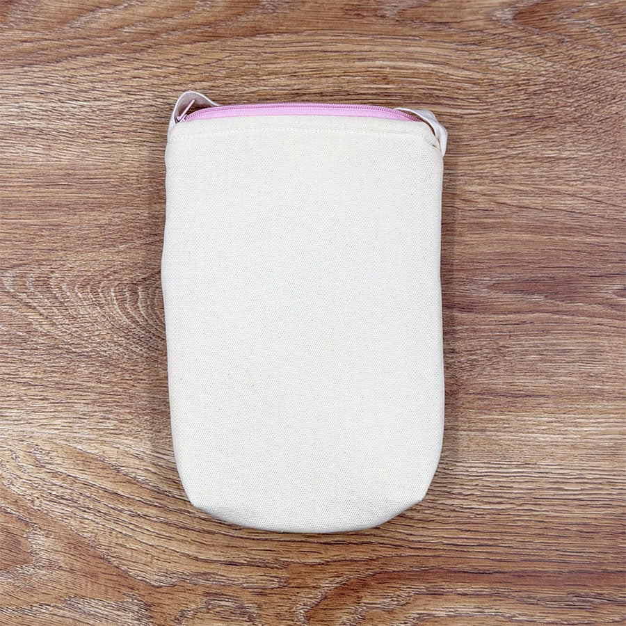 Bolsa beige con cierre y bordado otomí de colores