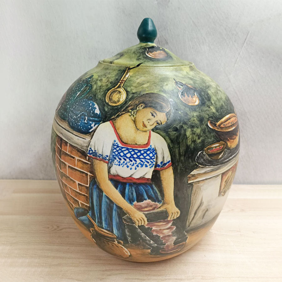 Long candy jar-shaped vase with peasant woman cooking