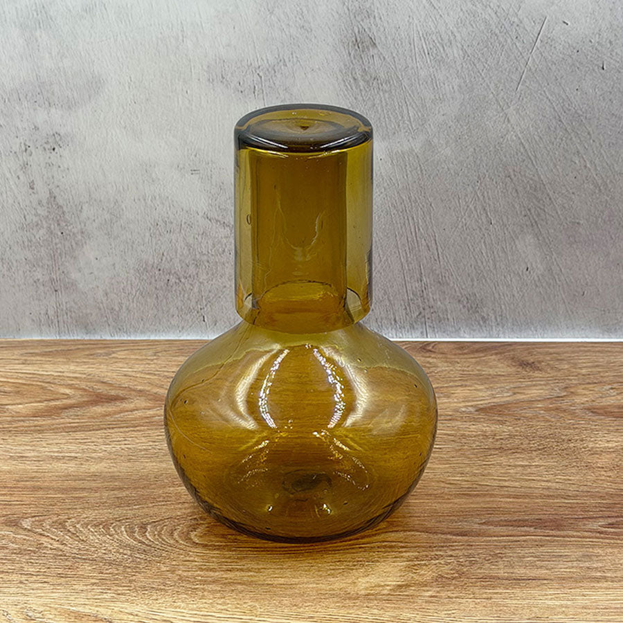 Ball-shaped water bottle for nightstand