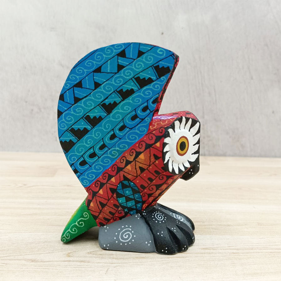 Red and blue alebrije owl