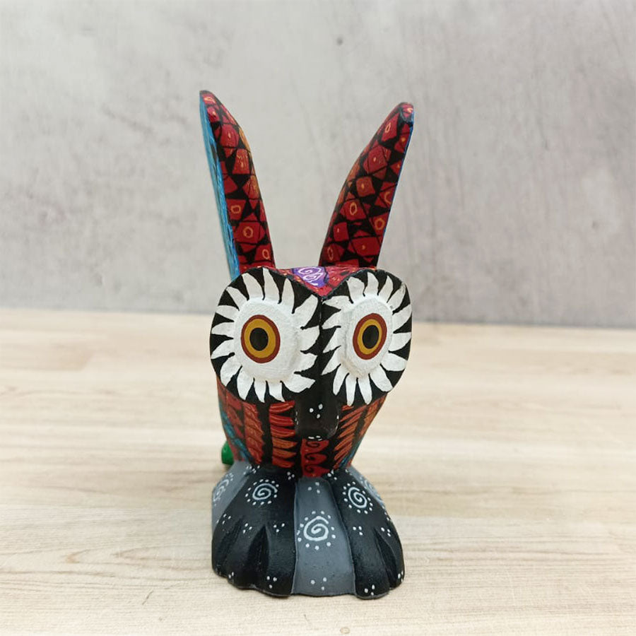 Red and blue alebrije owl