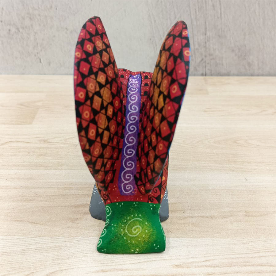 Red and blue alebrije owl