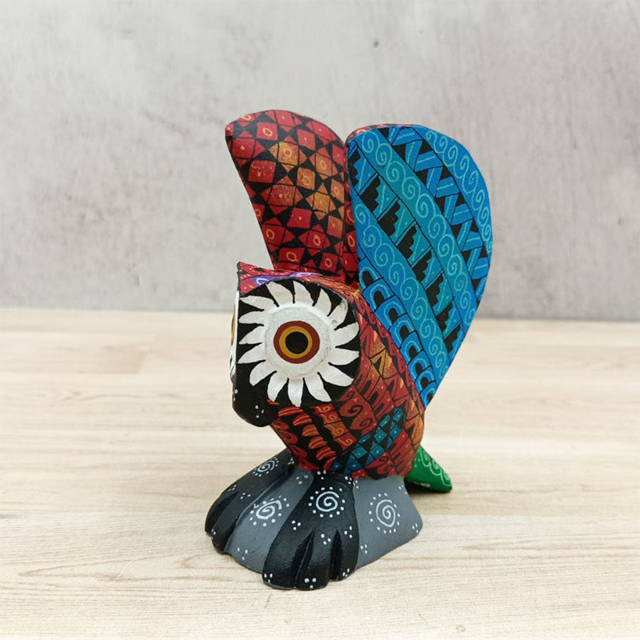 Red and blue alebrije owl