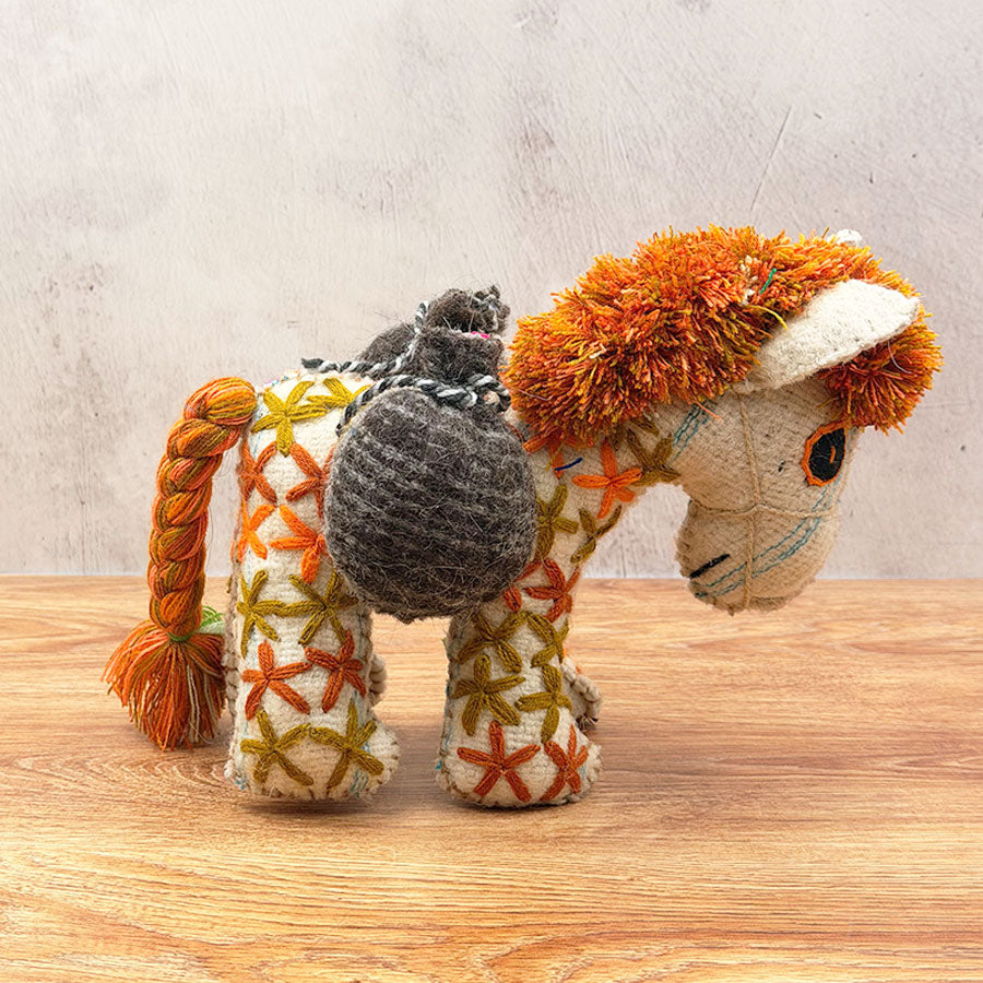 Little brown donkey animal