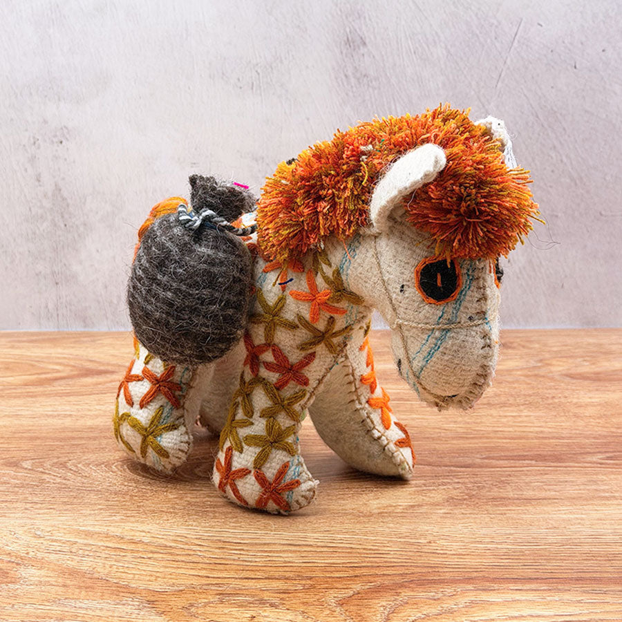 Little brown donkey animal