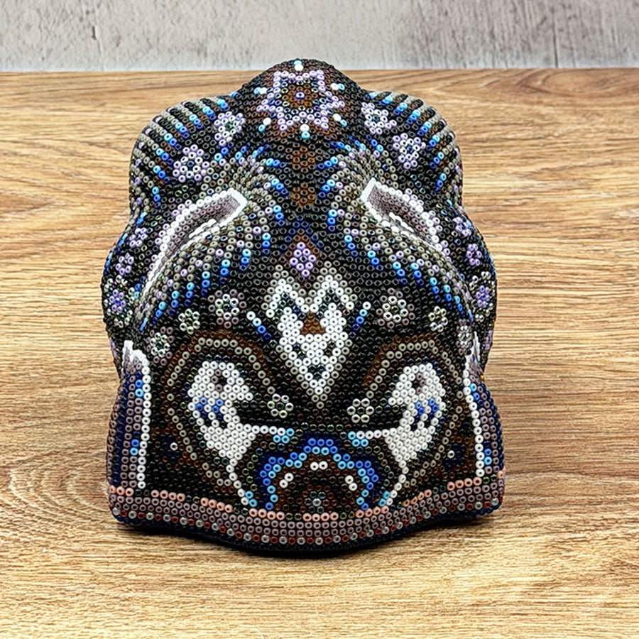 Jaguar head with Huichol art