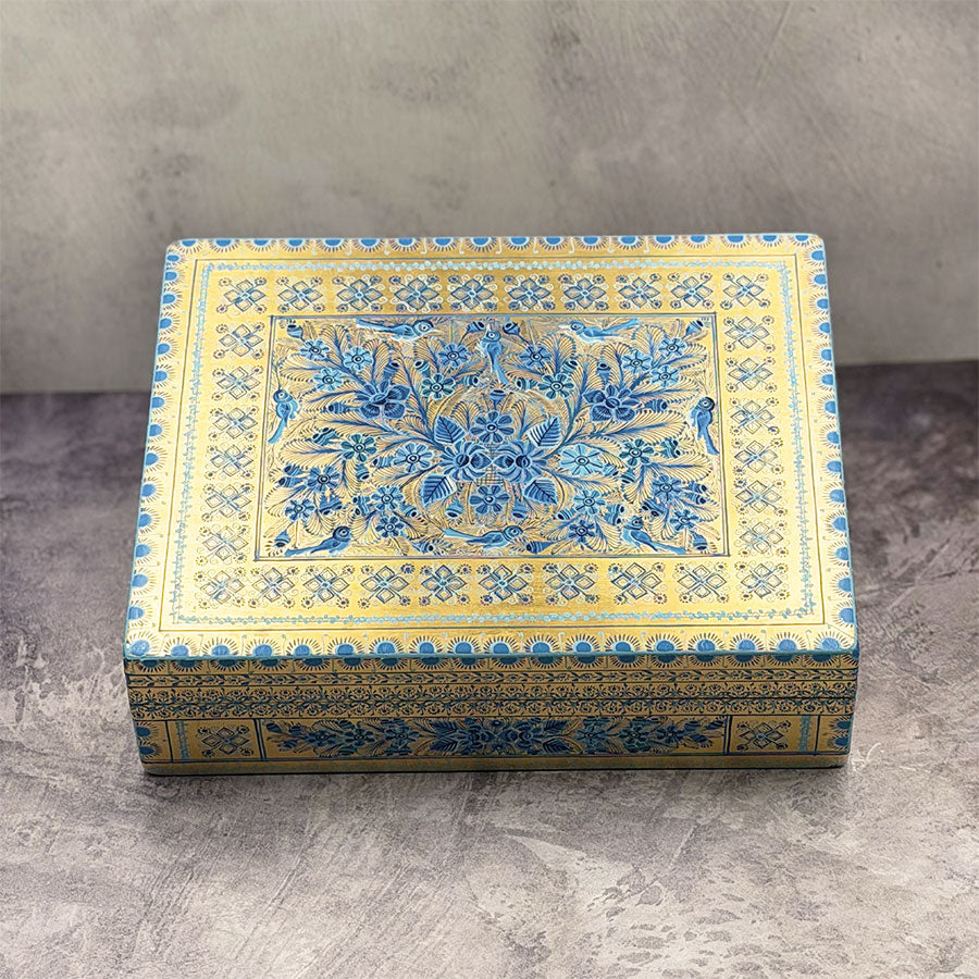 Rectangular gold box with blue design