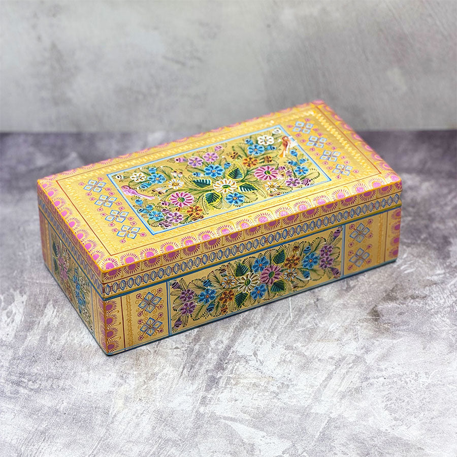 Rectangular gold box with multicolored design
