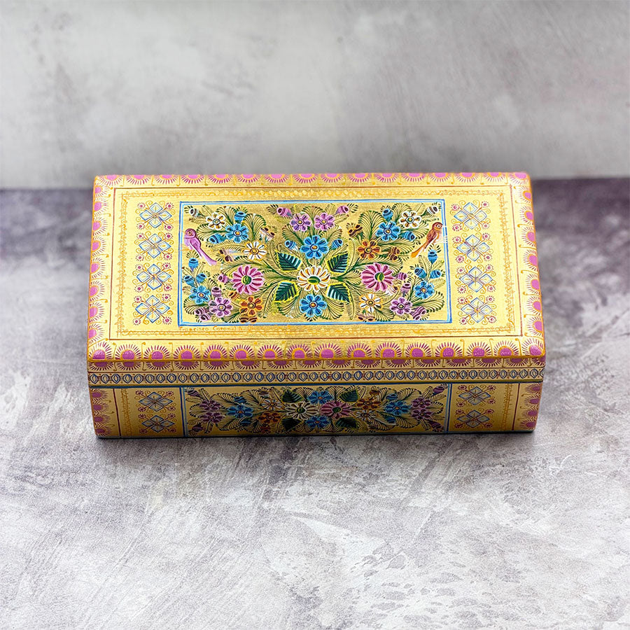 Rectangular gold box with multicolored design