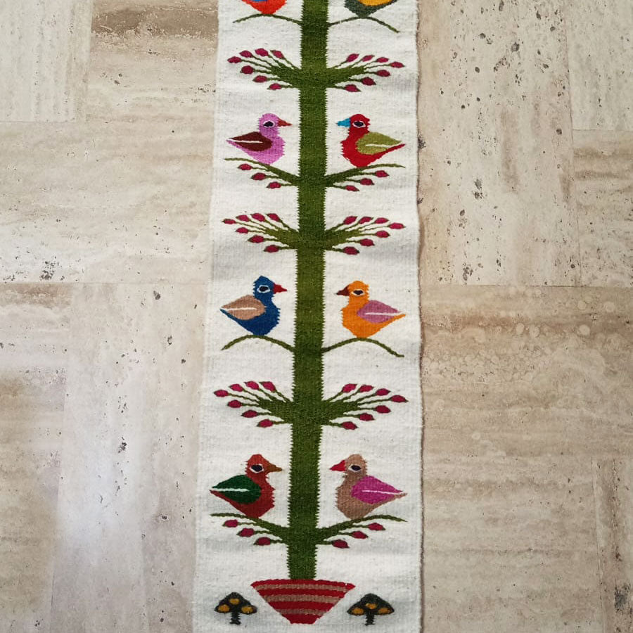 Table runner with Tree of Life design