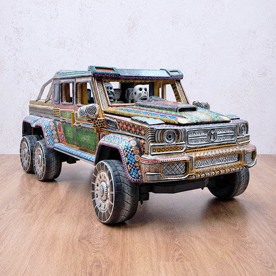 Decorated truck with a skull-themed driver