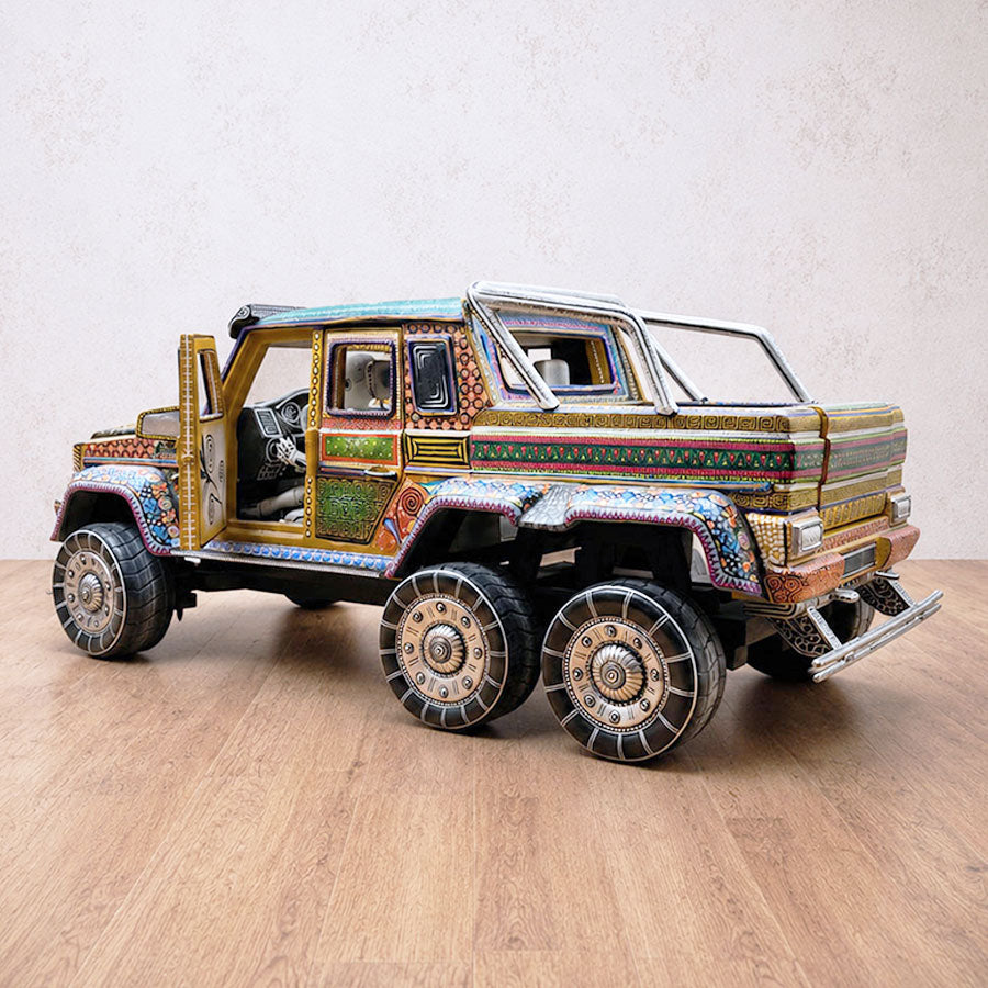 Decorated truck with a skull-themed driver