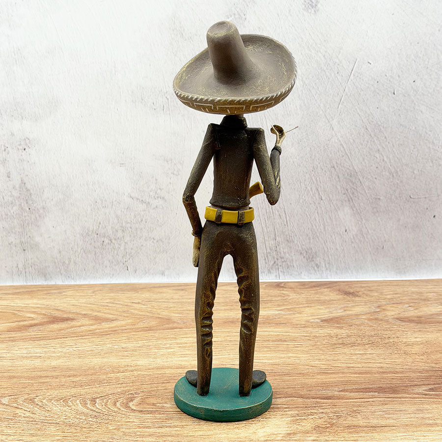 Catrín in a brown revolutionary suit