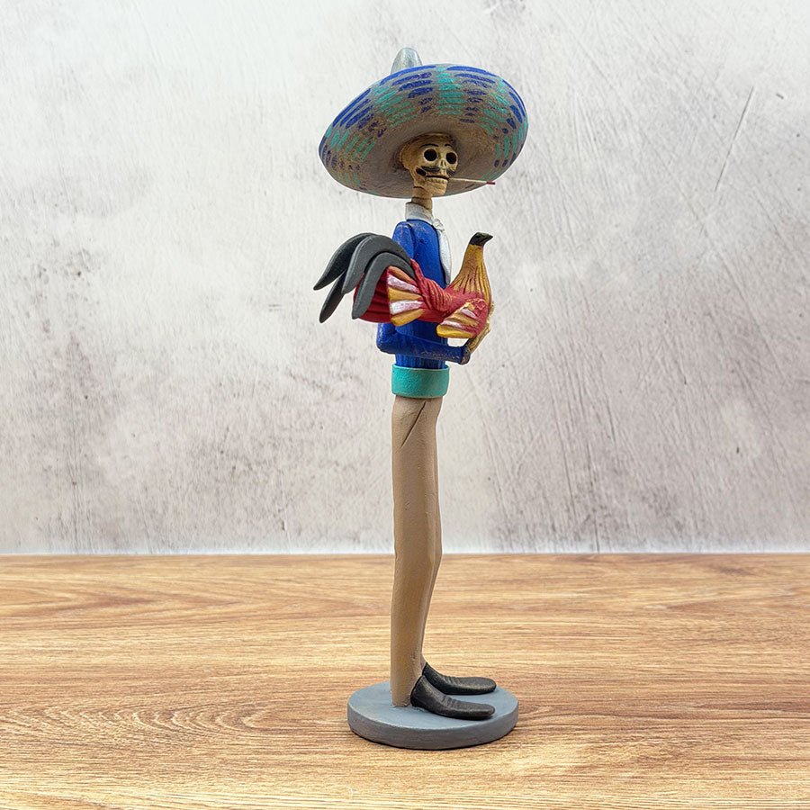 Blue and brown cockfighting catrín