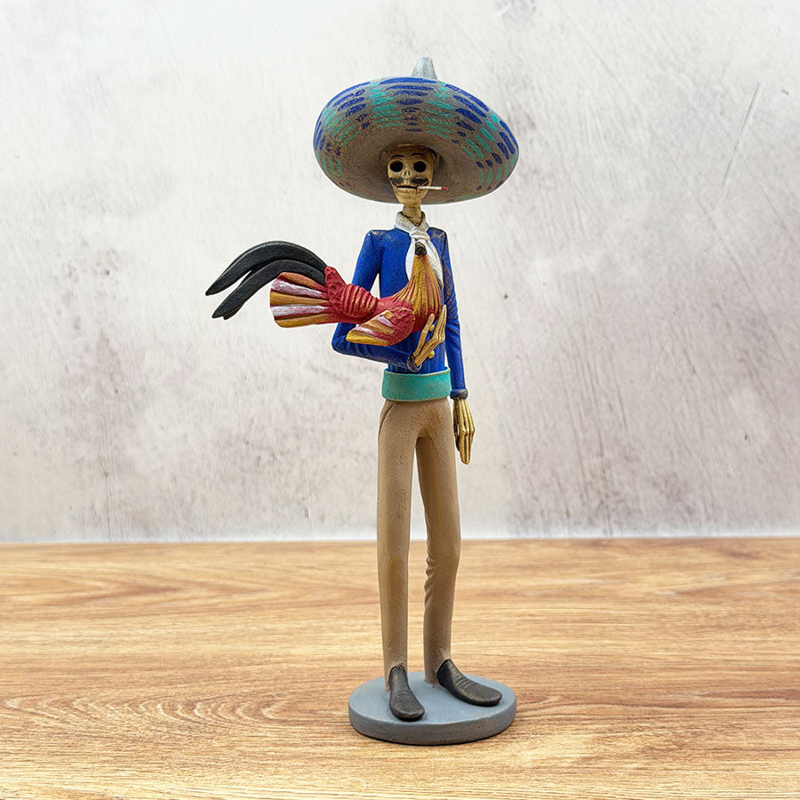 Blue and brown cockfighting catrín