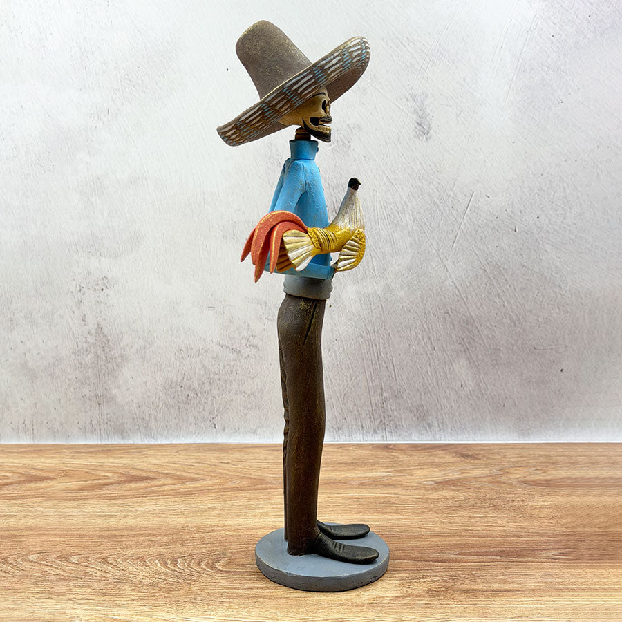 Blue and gold cockfighting catrín