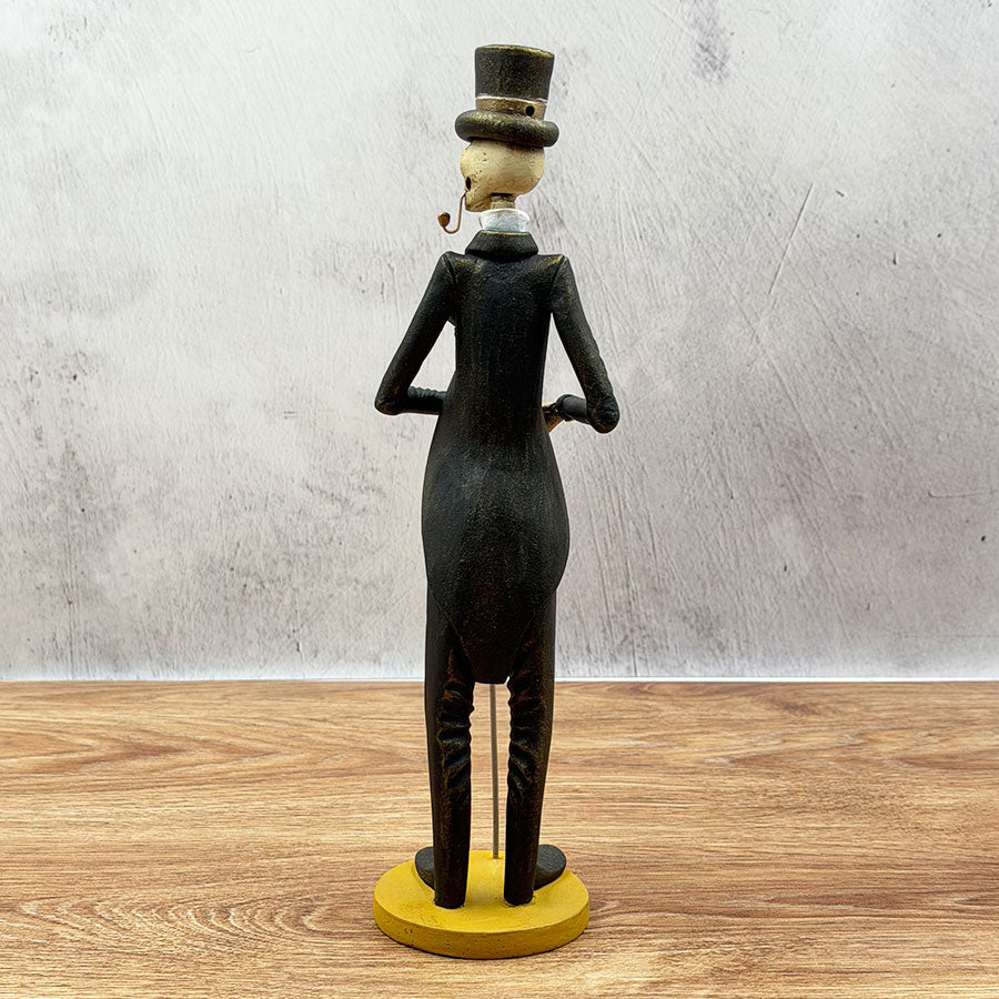 atrín with a brown and gold suit and a rose 